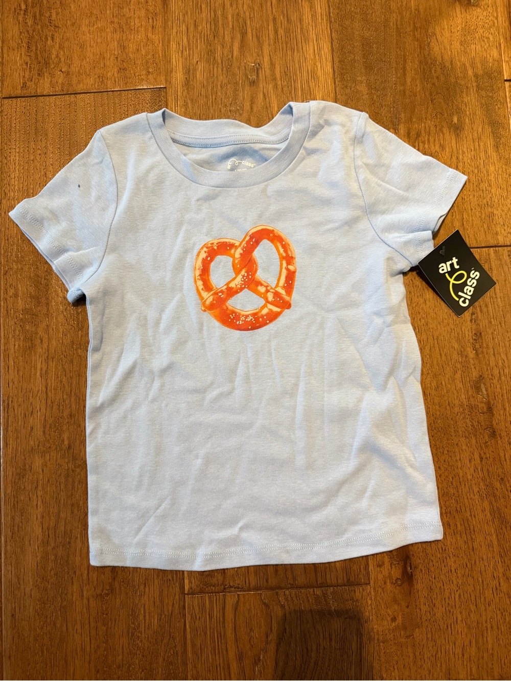 art class Light Blue Tee with Orange Pretzel Graphic